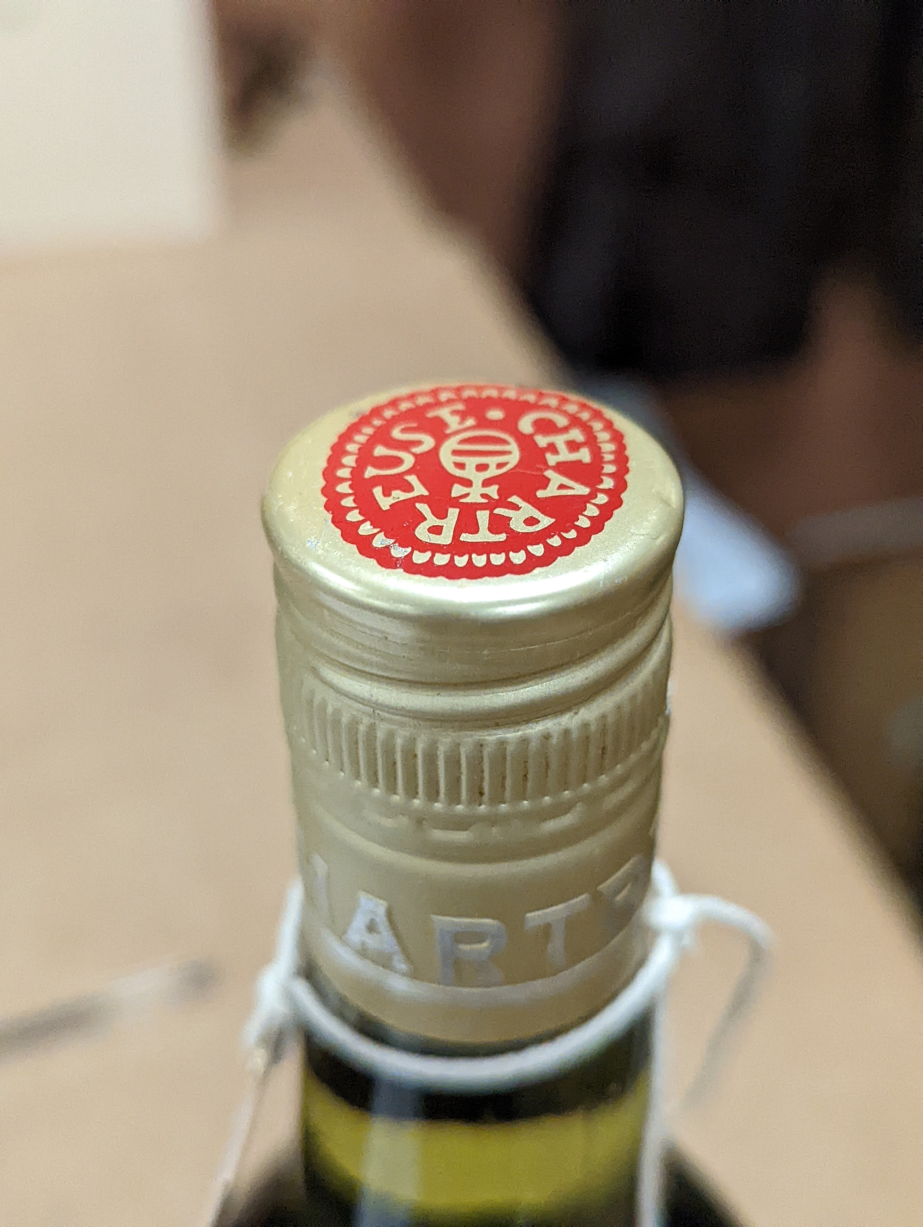 One Chartreuse bottle and ten Chartreuse miniatures
